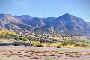 A majestic and prominent view of the Sacramento Mountain range in New Mexico rising above the open high desert country.