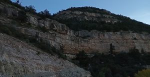 We Will Be One: A photograph of two massive rock mountains in New Mexico with trees on the top.